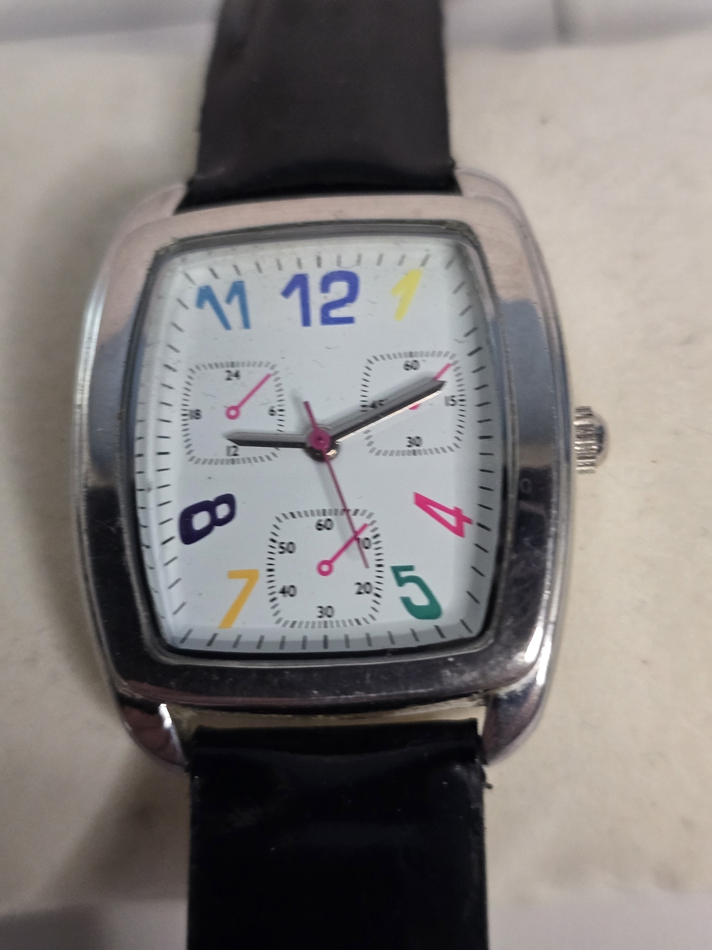 Merona White Dial Watch with Multicolored Numerals and Black Strap